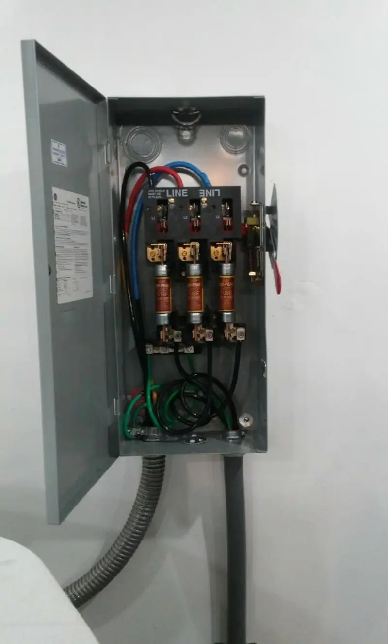 Three-phase disconnect switch installed for Smoke Detector Installation in Choccolocco